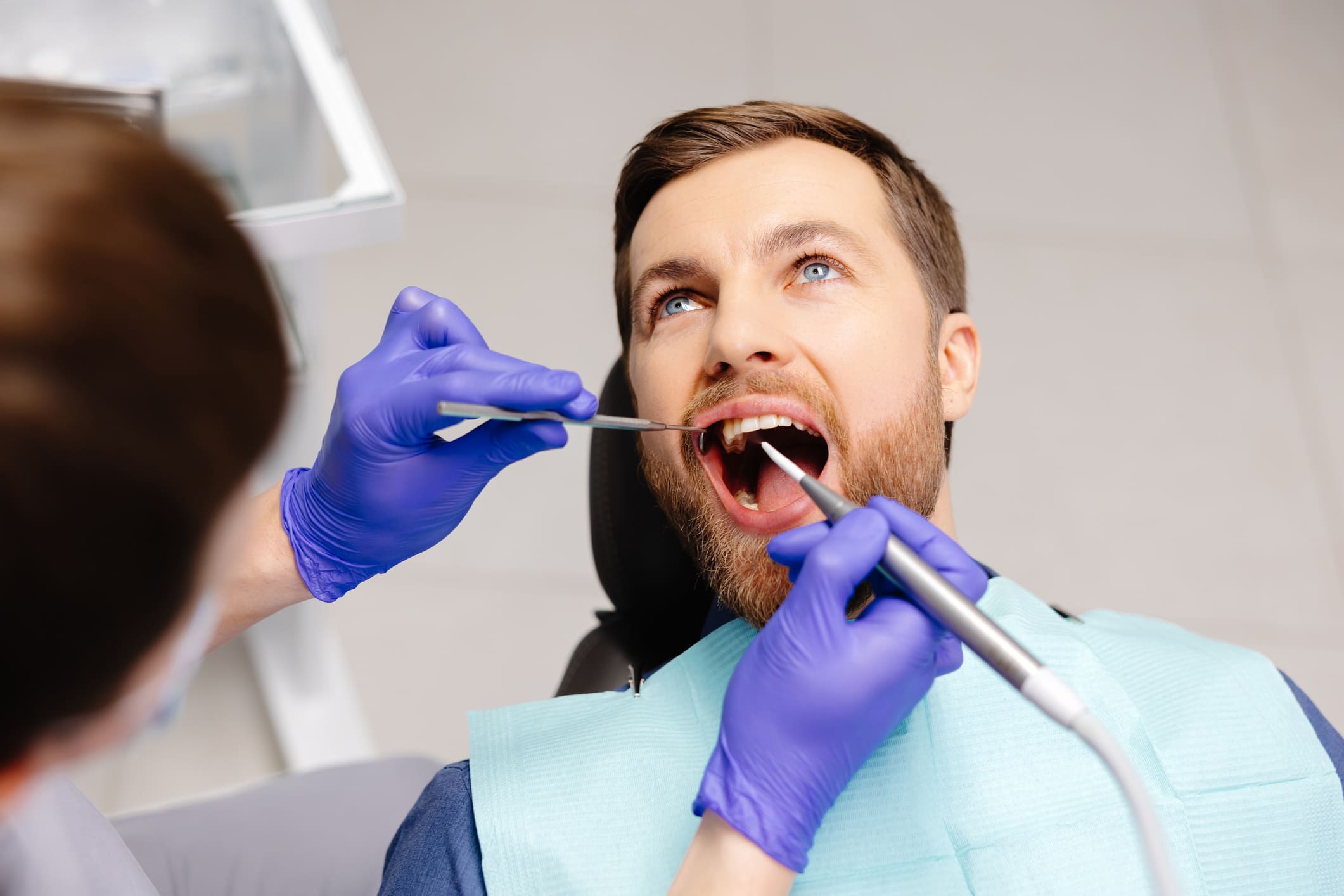 patient undergoing dental hygiene
